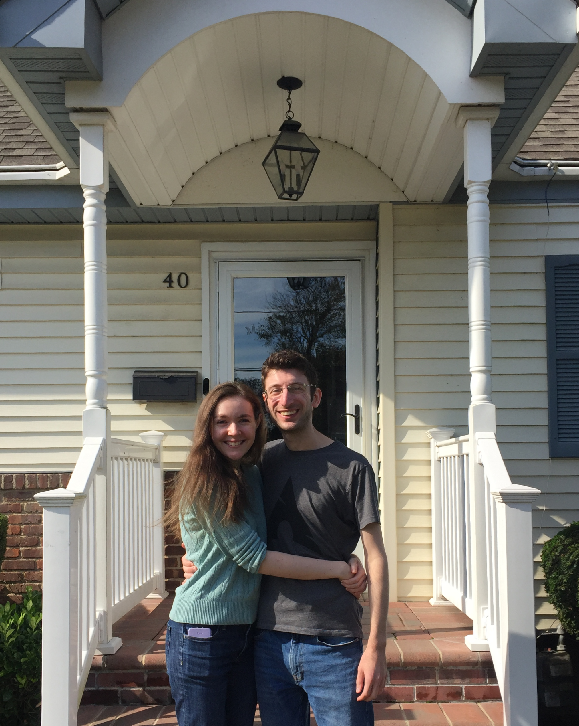 Ellen and Andrew in front of their home